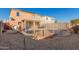 Inviting kidney-shaped pool with safety fence in a sunny backyard at 12305 W Flores Dr, El Mirage, AZ 85335