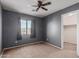 Spacious bedroom with neutral walls and carpet flooring at 12305 W Flores Dr, El Mirage, AZ 85335