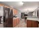 Kitchen boasts stainless steel appliances and lots of counter space at 12305 W Flores Dr, El Mirage, AZ 85335