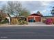 Charming single-story home with a well-manicured front yard and attached garage at 1232 E Mclellan Rd, Mesa, AZ 85203