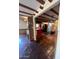 View of the kitchen showcasing red kitchen island, tile floors, and open layout at 1232 E Mclellan Rd, Mesa, AZ 85203