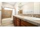 Clean bathroom with double sinks and a shower/tub combo at 13347 W Via Caballo Blanco --, Peoria, AZ 85383