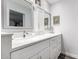 Modern bathroom vanity with double sinks and storage at 13438 W Ashwood Dr, Sun City West, AZ 85375