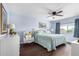 Spacious bedroom with ceiling fan and neutral decor at 13438 W Ashwood Dr, Sun City West, AZ 85375