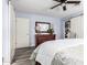 Main bedroom with dresser and large walk-in closet at 13438 W Ashwood Dr, Sun City West, AZ 85375