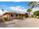 Exterior view of the home showing backyard access at 13438 W Ashwood Dr, Sun City West, AZ 85375