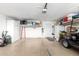 Two-car garage with overhead storage and plenty of space at 13438 W Ashwood Dr, Sun City West, AZ 85375