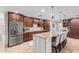 Spacious kitchen featuring granite countertops, stainless steel appliances, and ample cabinetry at 13438 W Ashwood Dr, Sun City West, AZ 85375