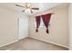 Bedroom with carpet, ceiling fan and double closet at 1374 W 16Th St, Tempe, AZ 85281