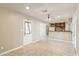 Living room with tile floors and access to kitchen at 1374 W 16Th St, Tempe, AZ 85281