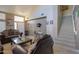 Living room with staircase, high ceilings, and a view of the entryway at 1406 S Navajo Ln, Coolidge, AZ 85128