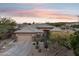 Single-story home with tile roof and desert landscaping at 14501 N Lark Ct, Fountain Hills, AZ 85268