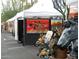 Outdoor art fair with Native American paintings and bronze sculptures at 14501 N Lark Ct, Fountain Hills, AZ 85268