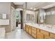 Elegant bathroom with double sinks and a bathtub at 14501 N Lark Ct, Fountain Hills, AZ 85268