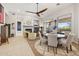 Open concept dining area with a round table and chairs near living room at 14501 N Lark Ct, Fountain Hills, AZ 85268