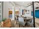 Elegant dining room with a round table and chairs, adjacent to kitchen at 14501 N Lark Ct, Fountain Hills, AZ 85268