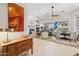 Bright and airy living room with a fireplace and dining area at 14501 N Lark Ct, Fountain Hills, AZ 85268