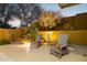 Desert landscaping with two chairs and lighting at 14501 N Lark Ct, Fountain Hills, AZ 85268