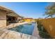 Long rectangular pool with a large patio at 14501 N Lark Ct, Fountain Hills, AZ 85268