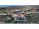 Aerial view of a single-story house with a red tile roof and mountain views at 16544 E Trevino Dr, Fountain Hills, AZ 85268