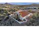 Single story home with red tile roof, nestled in the desert landscape at 16544 E Trevino Dr, Fountain Hills, AZ 85268