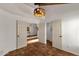 Well-lit bedroom with double door closets and terracotta tile floors at 16544 E Trevino Dr, Fountain Hills, AZ 85268