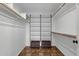 Large walk-in closet with shelving and shoe racks at 16544 E Trevino Dr, Fountain Hills, AZ 85268