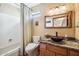 Bathroom with a bathtub, toilet and vessel sink at 17203 E Calaveras Ave, Fountain Hills, AZ 85268