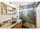 Modern bathroom with a glass-enclosed shower and a vessel sink at 17203 E Calaveras Ave, Fountain Hills, AZ 85268