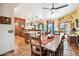 Rustic dining area with wooden table and access to backyard at 17203 E Calaveras Ave, Fountain Hills, AZ 85268