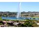 Large fountain in a lake, with residential area in the background at 17203 E Calaveras Ave, Fountain Hills, AZ 85268