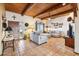 Living area with wood beams and tiled floors at 17203 E Calaveras Ave, Fountain Hills, AZ 85268