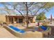 Spacious flagstone patio with seating and shade at 17203 E Calaveras Ave, Fountain Hills, AZ 85268