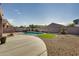 Landscaped backyard with pool and patio at 18473 W Piedmont Rd, Goodyear, AZ 85338