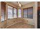 Bright breakfast nook with window seat and tile flooring at 18473 W Piedmont Rd, Goodyear, AZ 85338