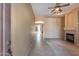 View from entryway, showcasing tile flooring and fireplace at 18473 W Piedmont Rd, Goodyear, AZ 85338