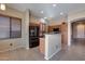 Kitchen features island and stainless steel appliances at 18473 W Piedmont Rd, Goodyear, AZ 85338