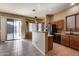 Kitchen with island, stainless steel appliances, and backyard access at 18473 W Piedmont Rd, Goodyear, AZ 85338