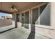 Covered patio with sliding glass doors leading to the interior at 18473 W Piedmont Rd, Goodyear, AZ 85338