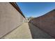 Side yard with gravel and block wall at 18473 W Piedmont Rd, Goodyear, AZ 85338