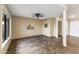 Living room with tile floors and ceiling fan at 19806 N Stardust Blvd, Sun City West, AZ 85375