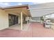 Covered patio with tile flooring, pergola and built-in grill at 19806 N Stardust Blvd, Sun City West, AZ 85375