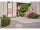 Condo building entry with stairs and landscaping at 205 N 74Th St # 159, Mesa, AZ 85207