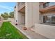 Private patio with grassy area and building exterior at 205 N 74Th St # 159, Mesa, AZ 85207