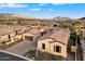 Aerial view of single Gathering home with driveway and landscaping at 2129 N Atwood --, Mesa, AZ 85207