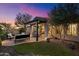 Covered patio with seating and view of the backyard at 2129 N Atwood --, Mesa, AZ 85207