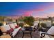 Relaxing patio area with seating and beautiful sunset views at 2129 N Atwood --, Mesa, AZ 85207