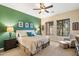 Main bedroom with green accent wall and ample natural light at 2129 N Atwood --, Mesa, AZ 85207