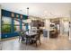 Bright dining area with kitchen views and a modern table at 2129 N Atwood --, Mesa, AZ 85207