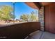 Private balcony overlooking the neighborhood and trees at 21655 N 36Th Ave # 106, Glendale, AZ 85308